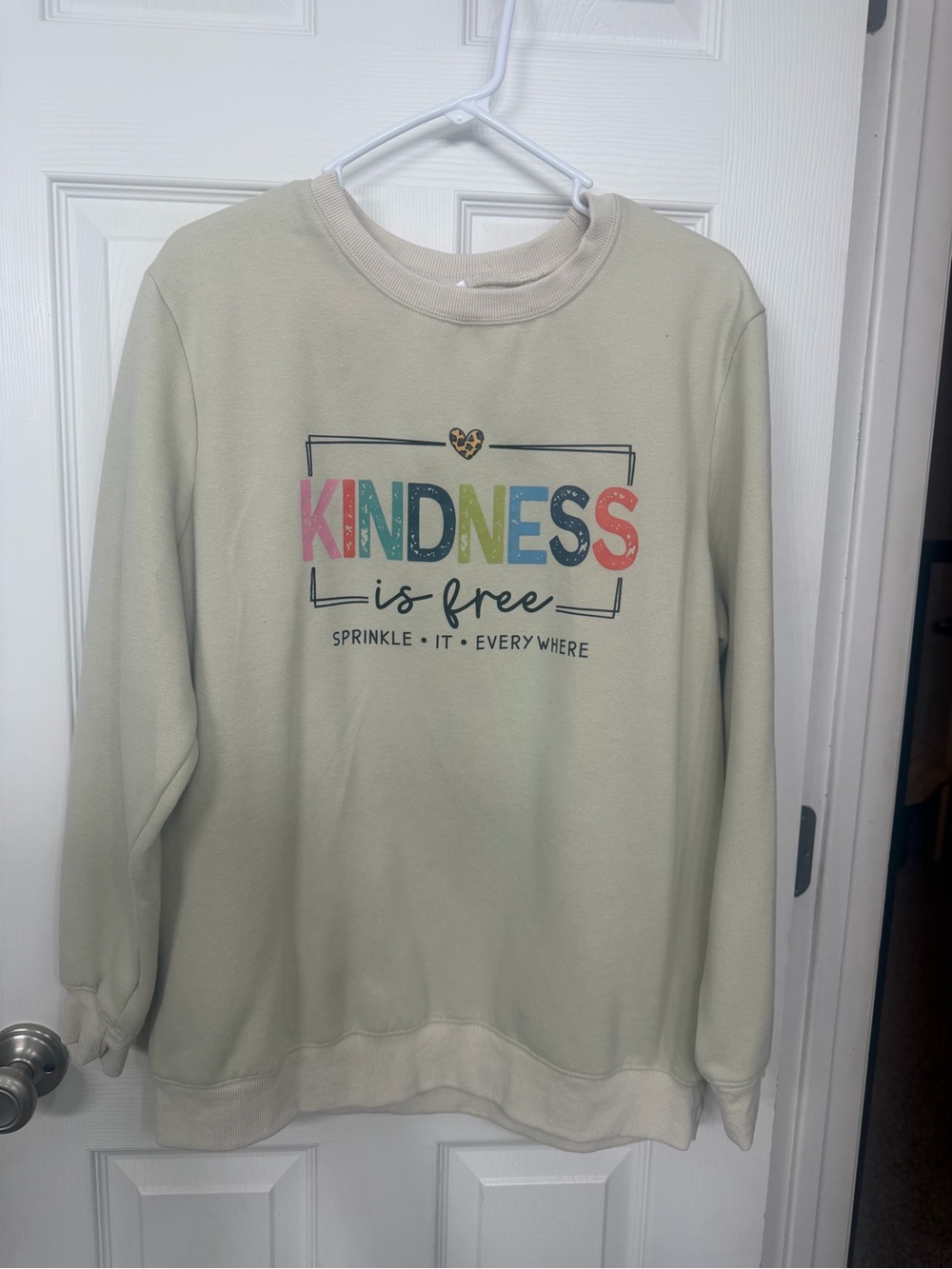 Kindness Is Free Women's Cream Graphic Sweatshirt